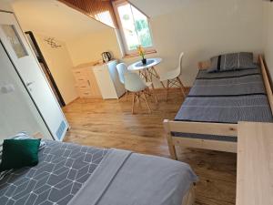 Postel nebo postele na pokoji v ubytování Dom Gościnny Bliżej Gwiazd