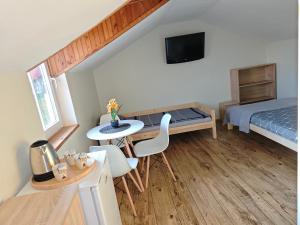 Postel nebo postele na pokoji v ubytování Dom Gościnny Bliżej Gwiazd