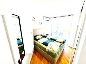 Ein Bett oder Betten in einem Zimmer der Unterkunft Apartamento Centro Torremolinos