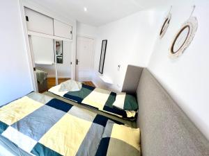 Ein Bett oder Betten in einem Zimmer der Unterkunft Apartamento Centro Torremolinos