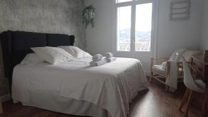 Postel nebo postele na pokoji v ubytování Hotel San Nikolas Sea Views
