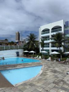 Πισίνα στο ή κοντά στο Aparthotel Orla de Ponta Negra RN