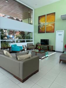 Χώρος καθιστικού στο Aparthotel Orla de Ponta Negra RN