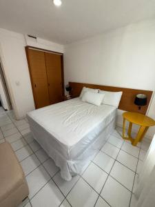 Ένα ή περισσότερα κρεβάτια σε δωμάτιο στο Aparthotel Orla de Ponta Negra RN +13 φωτογραφίες