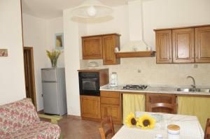 Kuchyň nebo kuchyňský kout v ubytování Agriturismo Renai e Monte II