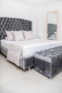 Voodi või voodid majutusasutuse Luxury air conditioning in Calazans toas