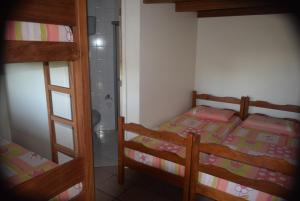 Postel nebo postele na pokoji v ubytování Ferrugem Home Complex + 4 fotografie