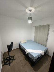 Ένα ή περισσότερα κρεβάτια σε δωμάτιο στο Republic Mansão