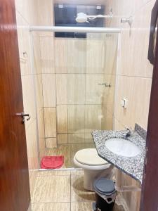 Ένα μπάνιο στο Apartamento prox Rodoviaria