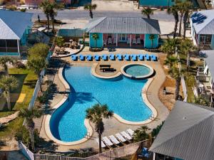 an aerial view of a pool at a resort at Paradise Found Gulf Shores Beach Pools Dogs in Gulf Shores
