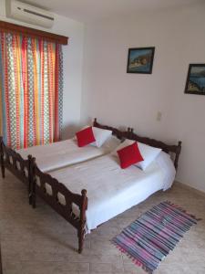 Ένα ή περισσότερα κρεβάτια σε δωμάτιο στο Kalotina's Apartments