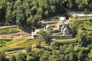 an aerial view of a large house on a hill at Agriturismo La Tensa in Domodossola