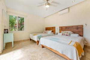 Postel nebo postele na pokoji v ubytování Casa de Paz, Jungle Bliss & Ocean Peek + 21 fotografií