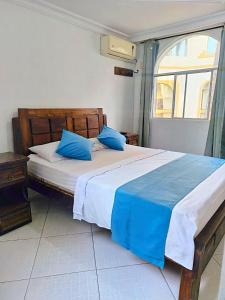 Postel nebo postele na pokoji v ubytování Apartamento cerca al mar-Santa Marta
