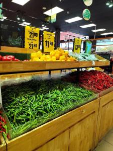 a produce section of a store with vegetables on display at Super Fully Furnished House next to airport - peaceful, leisure and quite in Langkawi Intl