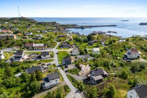 an aerial view of a small town next to the water at KB - Apartment in Sørvågen