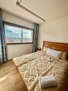 Postel nebo postele na pokoji v ubytování Appartement spacieux avec parking