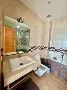 Koupelna v ubytování Appartement spacieux avec parking + 31 fotografií