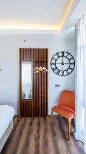 Postel nebo postele na pokoji v ubytování Discovery Hotel