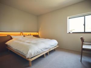 Ένα ή περισσότερα κρεβάτια σε δωμάτιο στο SANU 2nd Home Nasu 3rd