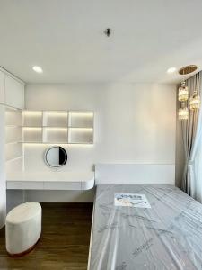 Ένα ή περισσότερα κρεβάτια σε δωμάτιο στο Happyone Central Dep 38th Floor