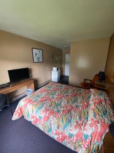 Postel nebo postele na pokoji v ubytování ValleyView Motel