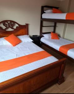 Postel nebo postele na pokoji v ubytování Hostel Tierra de Fuego