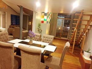 Posezení v ubytování Sumaq Sisa Home & Loft