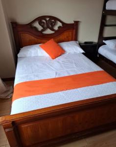 Postel nebo postele na pokoji v ubytování Hostel Tierra de Fuego