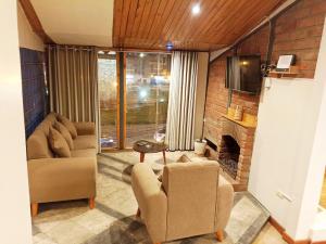 Posezení v ubytování Sumaq Sisa Home & Loft