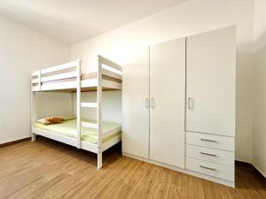 Ένα ή περισσότερα κρεβάτια σε δωμάτιο στο GlamSea