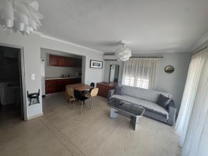 A seating area at Τhe Sunny Apartments