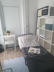 Ein Bett oder Betten in einem Zimmer der Unterkunft BnbMarlies