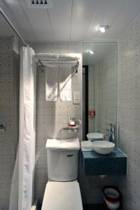 Ванная комната в Mingle by The Park