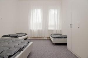 מיטה או מיטות בחדר ב-Hostel Valtice