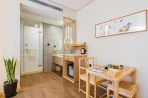 Ένα μπάνιο στο Hidden Abode Hotel, Chengdu Chunxi Road Tianfu Square Branch +59 φωτογραφίες