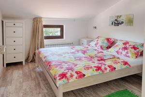 Postel nebo postele na pokoji v ubytování Apartments Tena