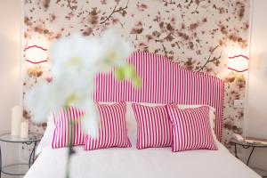 Postel nebo postele na pokoji v ubytování B&B Maiurè