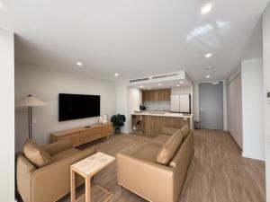 TV a/nebo společenská místnost v ubytování Unit 307-SERENITY