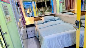 LongWin Hostel - Jordan MTR 객실 침대