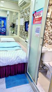 LongWin Hostel - Jordan MTR 객실 침대