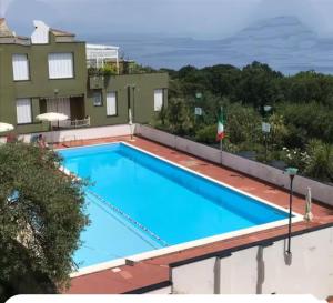 an image of a swimming pool on top of a building at La casa di Giò in Varazze