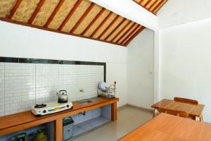 Kuchyň nebo kuchyňský kout v ubytování Vaneka Garden House
