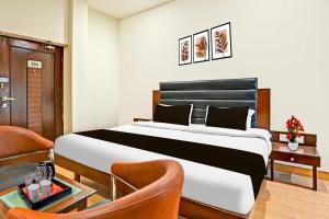 Letto o letti in una camera di Hotel O Gurudwara Square