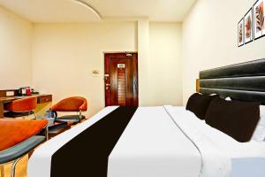 Letto o letti in una camera di Hotel O Gurudwara Square