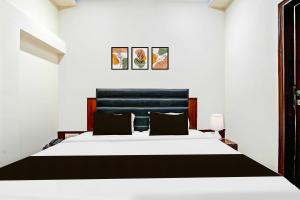 Letto o letti in una camera di Hotel O Gurudwara Square