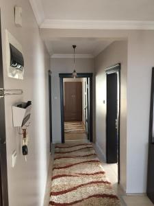 A bed or beds in a room at Safa Apartment