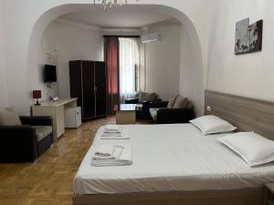 Voodi või voodid majutusasutuse Olive hotel toas
