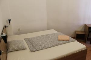 Posteľ alebo postele v izbe v ubytovaní Capital Guesthouse Budapest