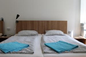 Posteľ alebo postele v izbe v ubytovaní Capital Guesthouse Budapest